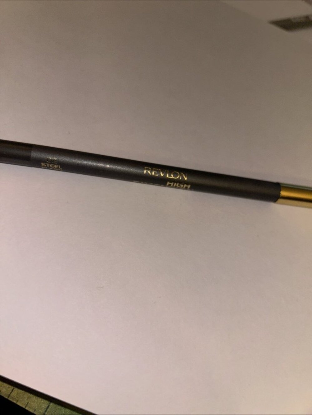Revlon eyeliner high dimension in 02 Steel Flash (charcoal gray) pencil